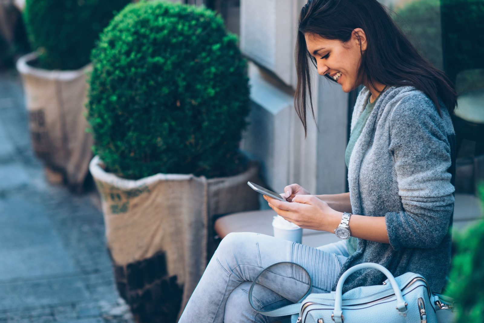 Woman checking Go Authentication Nexus
